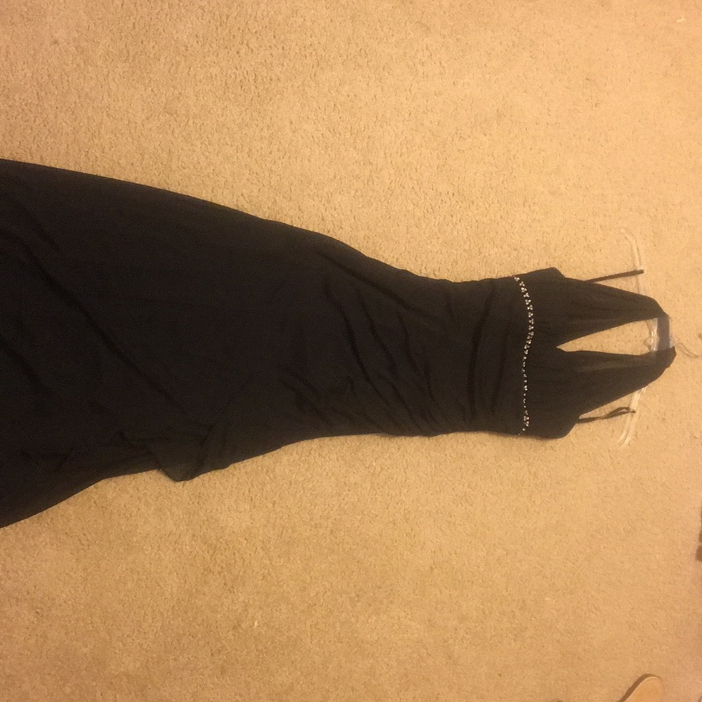Cache black evening gown.